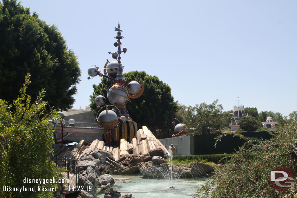 Notice the walkway by the fountains to Tomorrowland is still available. You walk along the walls.