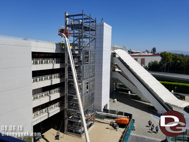 Framing for the exterior of the new elevator shaft is being installed.