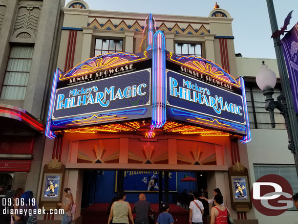 The Sunset Showcase Theater entrance at dusk.