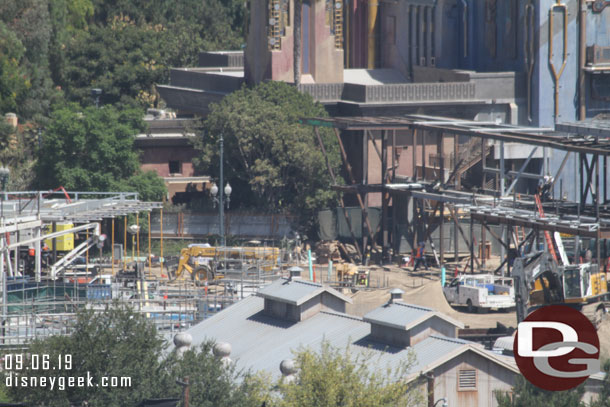 Panning left more scaffolding and work on the plaza and buildings in the Avengers Campus 