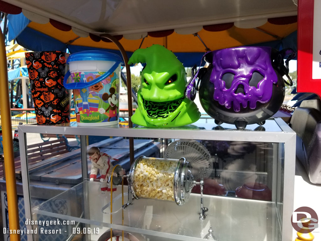 The Oogie Bookie Head is the standard bucket and the  Cauldron is the AP one which has a refill option of $1.50 through October 31st.