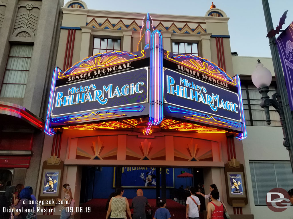 The Sunset Showcase Theater entrance at dusk.