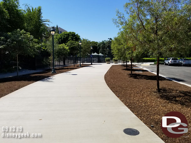 The walkway jogs around the security check point.  Wonder if the plan is to relocate that.  Also kind of awkward if you plan to go to the Disneyland Hotel you have to either go through security or walk back and around. There is no straight path.