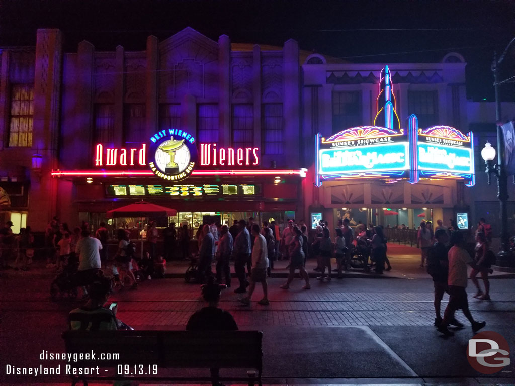 Sunset Showcase Theater sign lit up at night.