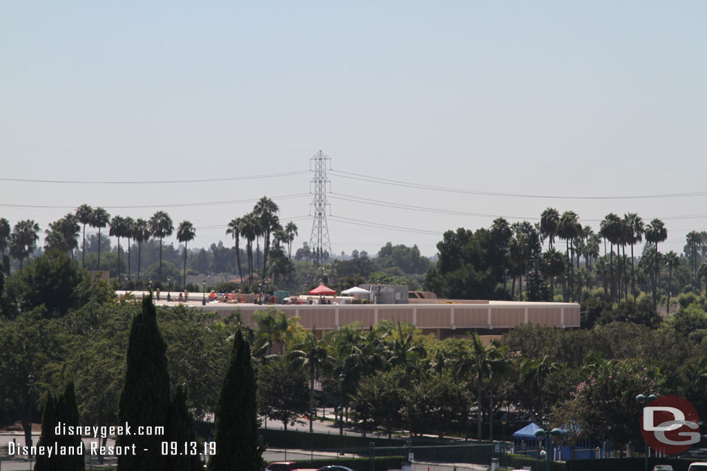 Work on the roof level parking at the Disneyland Hotel, hard to tell what is being done from this distance.