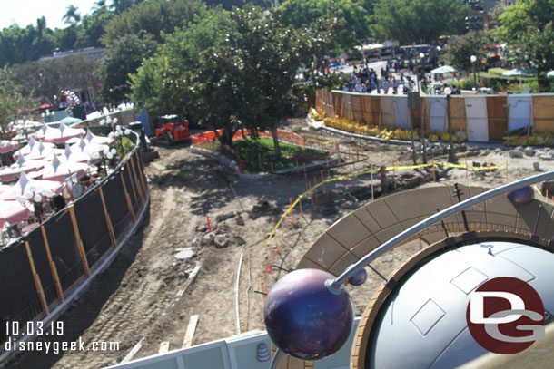 The rockwork and planters are gone as well as the curb and sidewalk on the hub side.