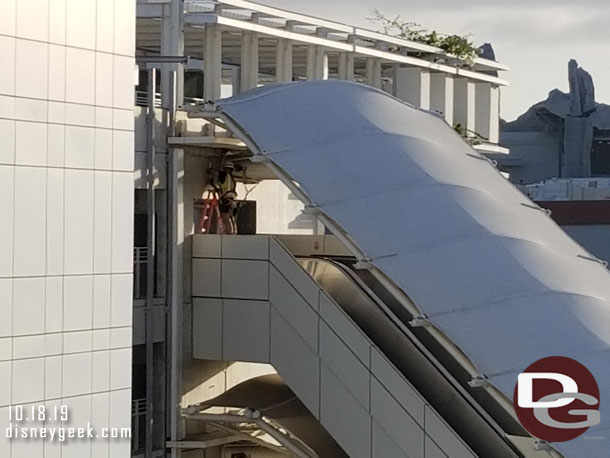 Looks like they are working on the area around the escalators, not the escalators themselves. 