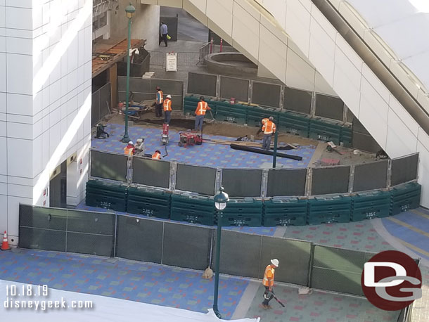 Paver work on both sides of the old escalator as they are replacing the pavers in the area to make them match the rest of the plaza.