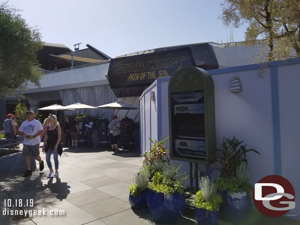 FastPass distribution for Tomorrowland has moved to this set of kiosks in the former queue space for the theater.  You can pick up a FastPass for Space Mountain, Star Tours or Buzz Lightyear here.