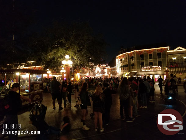 The wait for your picture with the giant Mickey pumpkin wrapped around Town Square to the Churro Cart.