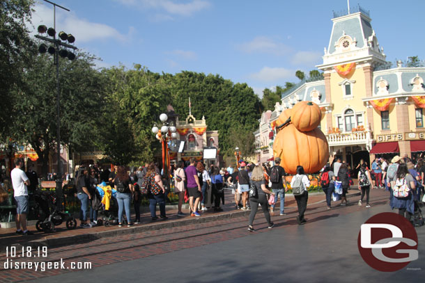 A TV crew set up in Town Square by the pumpkin, means only the Main Street side is open for pictures causing a long line this morning.