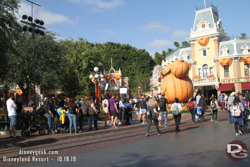 A TV crew set up in Town Square by the pumpkin, means only the Main Street side is open for pictures causing a long line this morning.