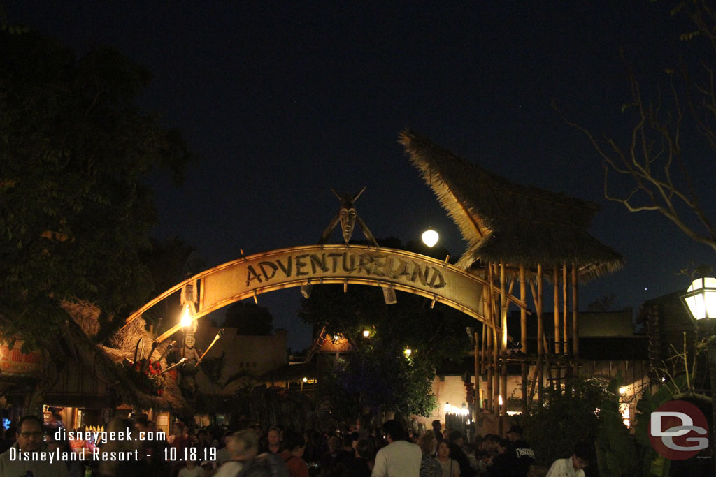 The Adventureland entrance after dark.