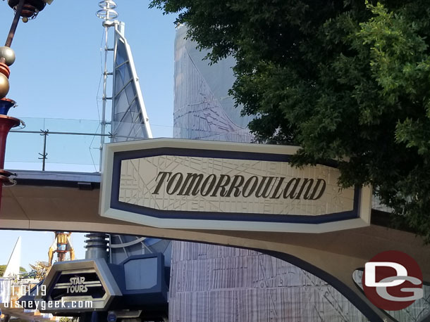 Renovation work on the building exteriors as you enter Tomorrowland continues.  The winds have calmed so scrims are back up.