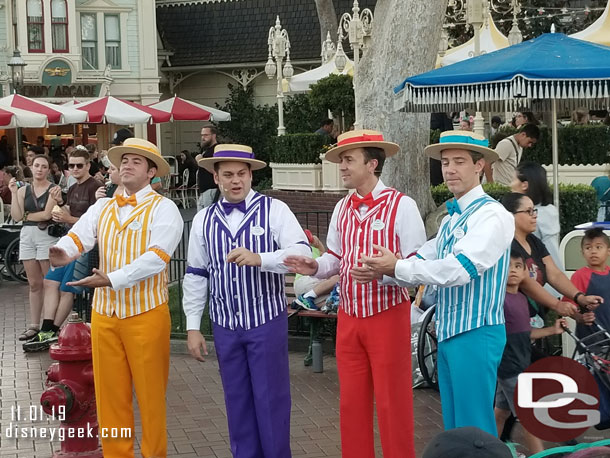 Dapper Dans of Disneyland performing along Main Street USA