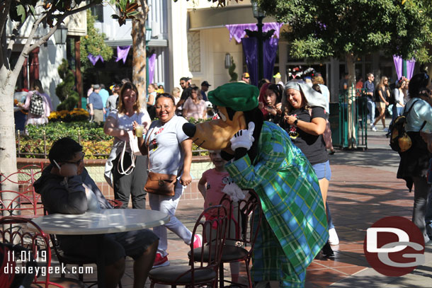 Goofy goofing around with a guest on Buena Vista Street.