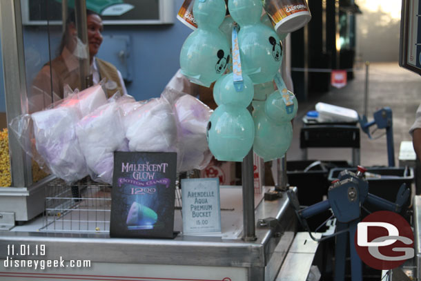 Maleficent Glow Cotton Candy and Arendelle Aqua popcorn buckets for sale at the Hyperion.