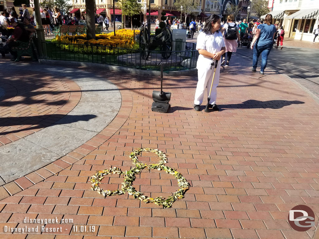 A cast member created some leaf art in Town Square.