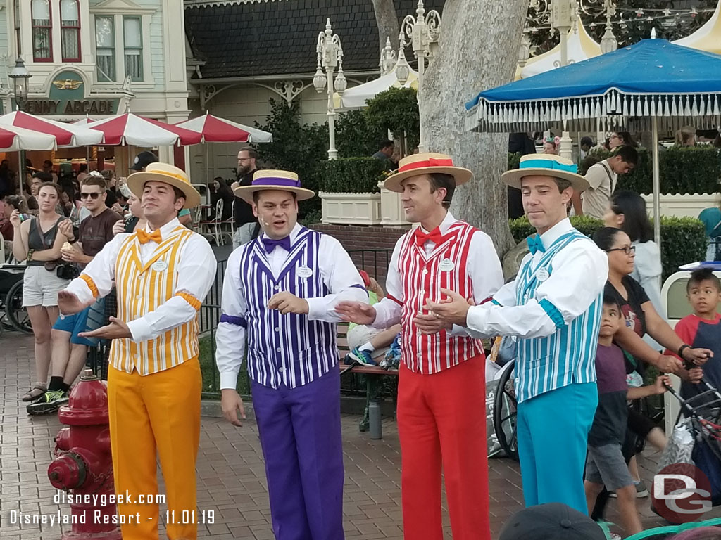 Dapper Dans of Disneyland performing along Main Street USA