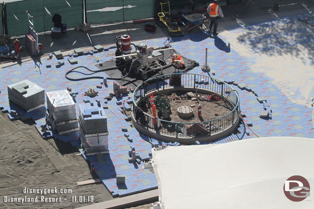 Fences have been reconfigured again and work on the final sections of pavers is underway.  Friday both the the lower level escalators were not available.