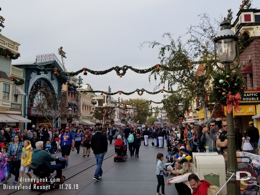 Found a spot for the 3:30 Christmas Fantasy Parade (it was 3:32 and it had just stepped off at small world).