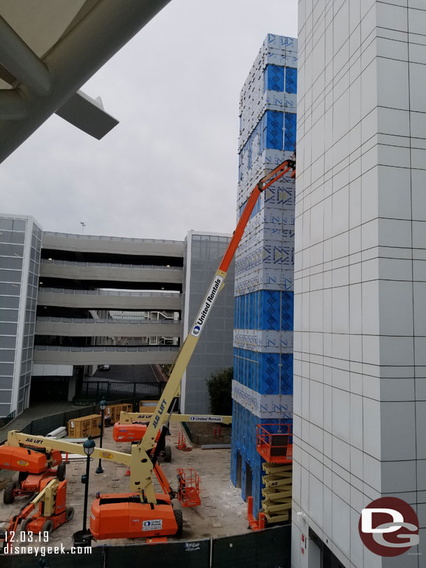 Crews working on the new elevator shaft exterior.