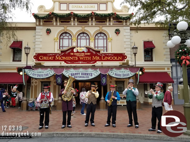 Dickens Yuletide Band performing in Town Square.