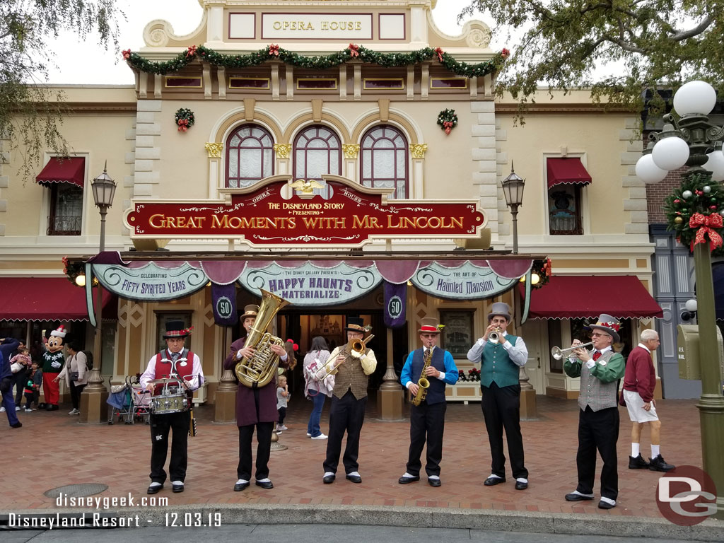 Dickens Yuletide Band performing in Town Square.