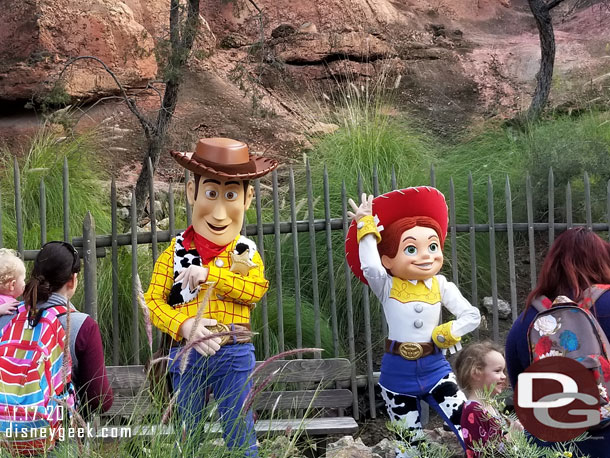 Woody and Jessie meeting guests along the Big Thunder trail across from the entrance to Star Wars: Galaxy's Edge.