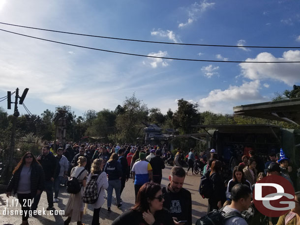 The area near the attraction entrance was busy.  There were a number of guests milling about waiting for their boarding group to be called.