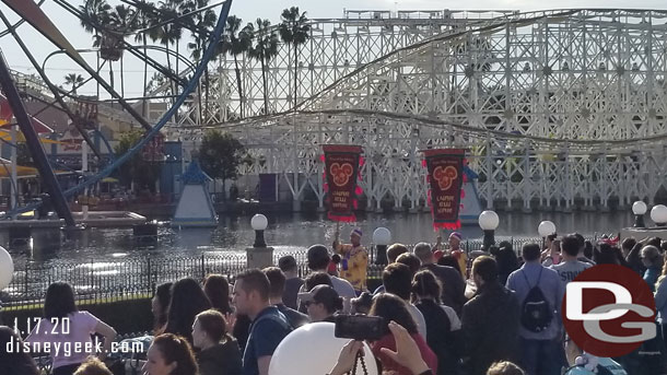 The procession arriving in Paradise Gardens Park. It starts at the parade gate between Pixar Pier and Paradise Gardens.