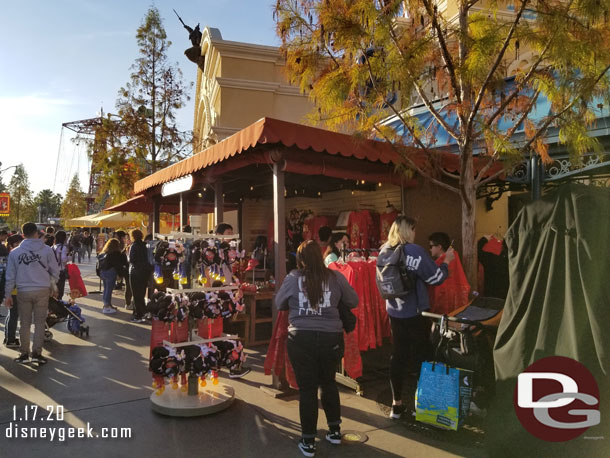 Lunar New Year Merchandise is available at a stand in front of the Little Mermaid.