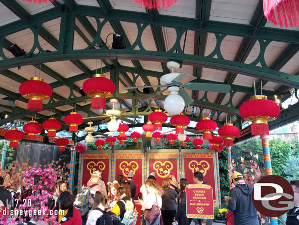 In the back is Chinese Brush Painting & Calligraphy and the front a table to write out your wish