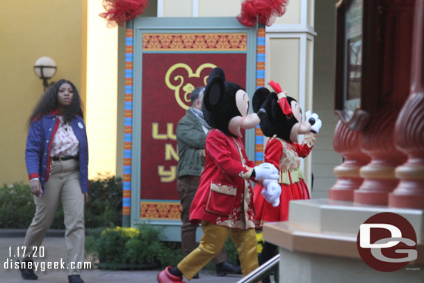 Mickey and Minnie arriving to meet guests.