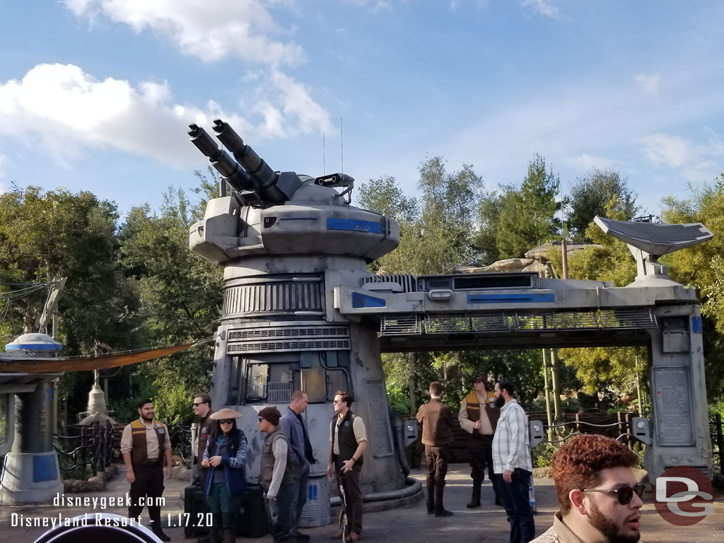 A second line of cast members at the attraction entrance.