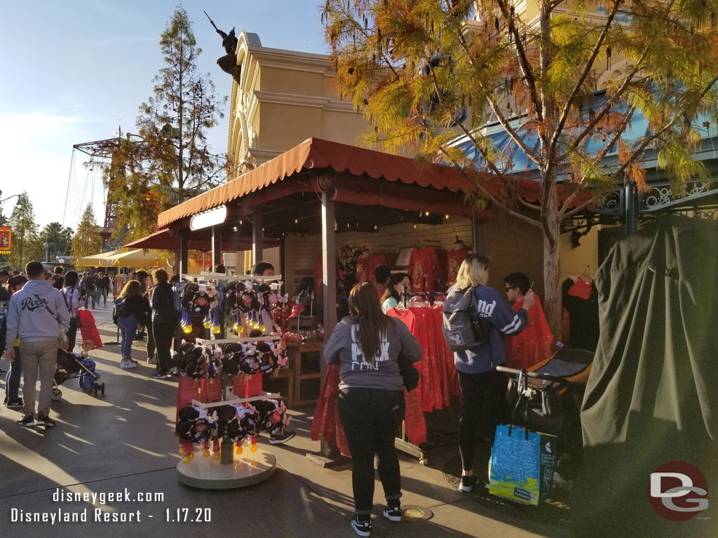 Lunar New Year Merchandise is available at a stand in front of the Little Mermaid.