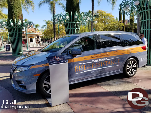 A Honda van featuring Rise of the Resistance graphics parked in the Esplanade