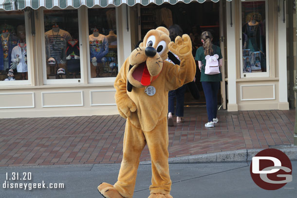 Pluto greeting me in Town Square.