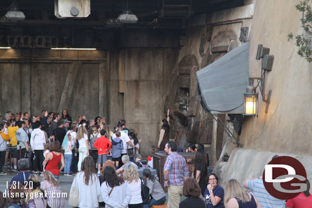 I heard a loud cheer from the crowd and nice Chewie was interacting with the Smugglers Run queue. It seemed he was trying to do the wave or something. It was a little hard to tell from across the courtyard.