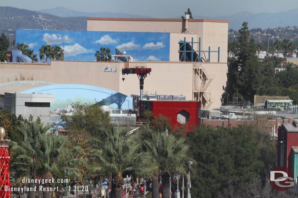 The Avengers Campus rising above the tree line.