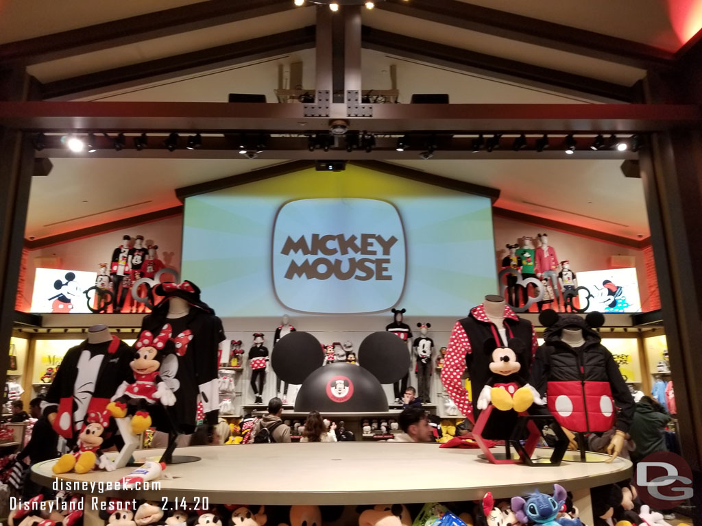 The center section features Mickey Mouse merchandise