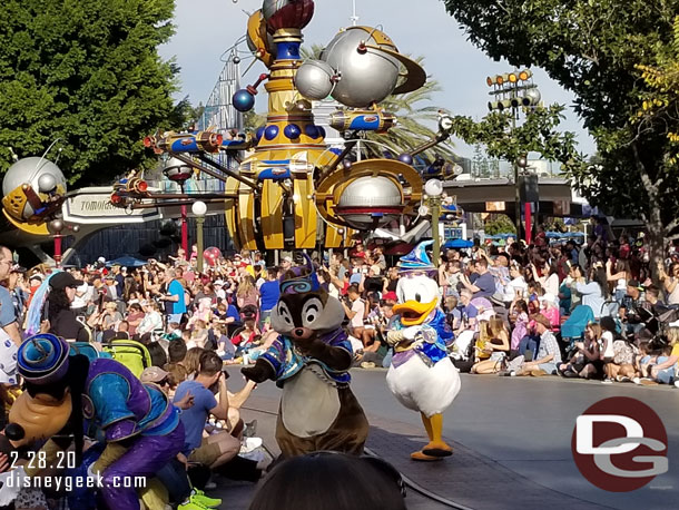 Chip, Dale, Donald, Goofy, Pluto and Minnie follow on foot.