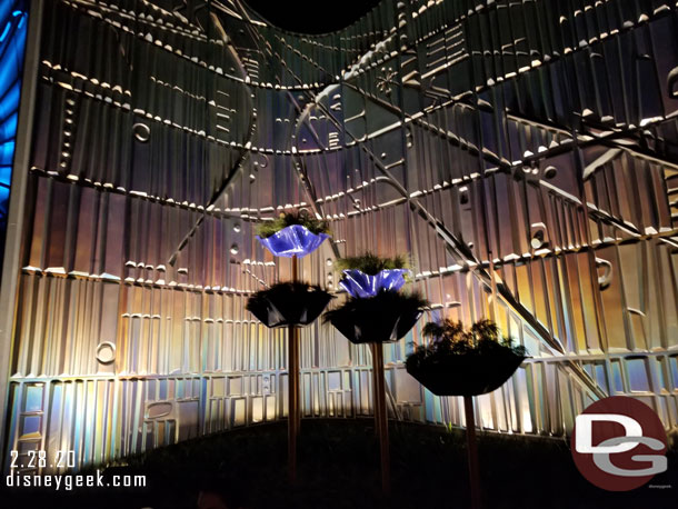 The new Tomorrowland Entrance planters at night.