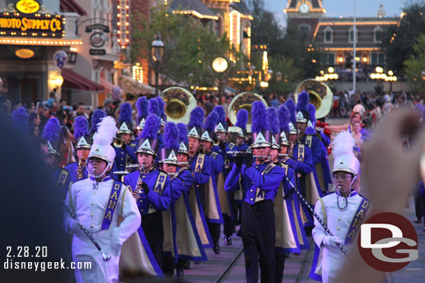 Dana Middle School Marching Band was playing it's a small world then Mickey Mouse Club March as they passed by.