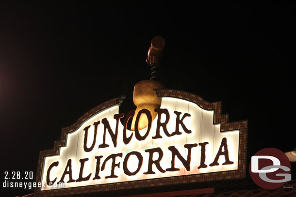 Festival Marketplace signs at night.