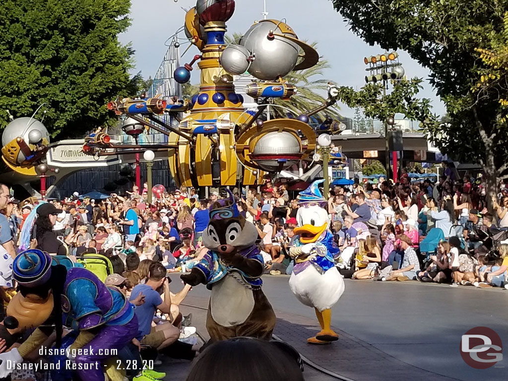 Chip, Dale, Donald, Goofy, Pluto and Minnie follow on foot.