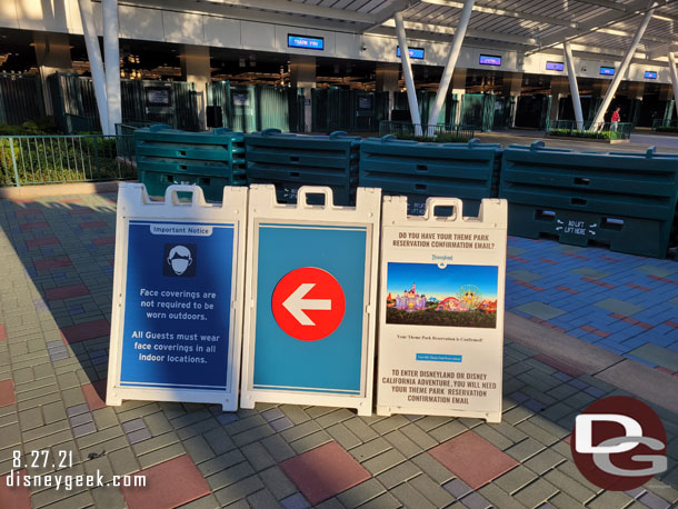 Notice the green barriers.  You now have to walk around on the tram route and the flow is reversed through security from how the structure was built.