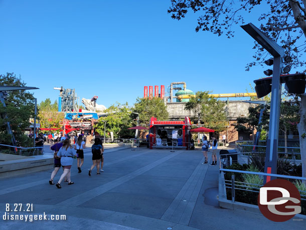 A merchandise cart and beyond it the restrooms.  This area used to be Flik's Fun Fair.  The restrooms have not moved so you can use them to orient yourself.