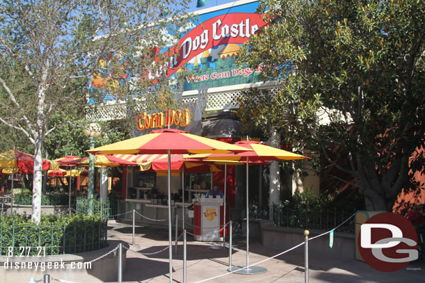 Corn Dog Castle has a single register on the side now, mobile pickup is the center space.