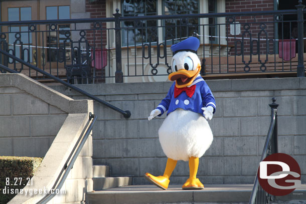 Donald out with several others visiting with guests from the Main Street Train Station